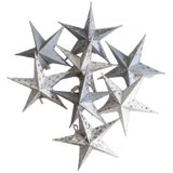 Set of 8 white mini paper stars in neutral and silver tones, perfect for holiday ornaments or year-round home decor accents.