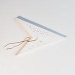 folded white paper star lantern