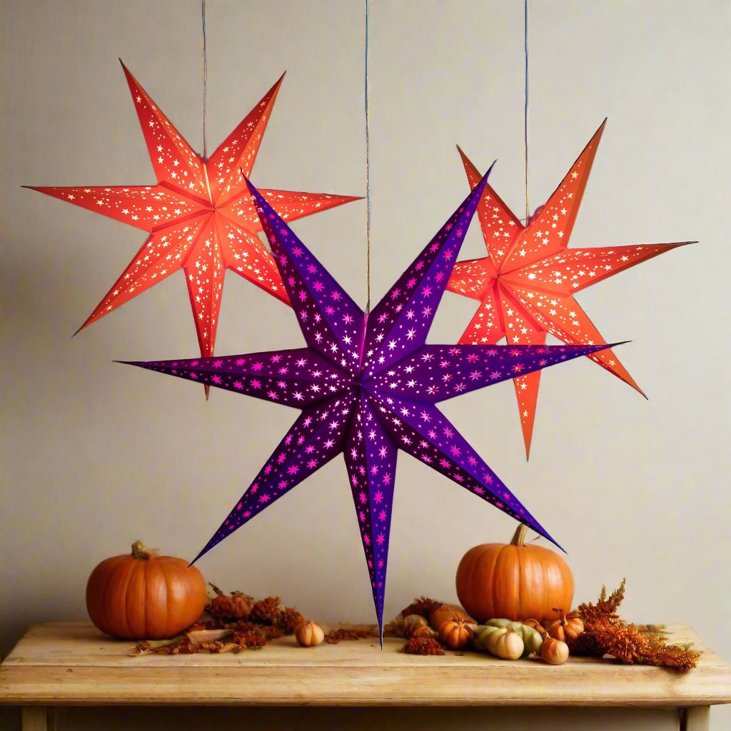 Halloween decorations and lighting - pumpkin orange star lanterns and purple light illuminated