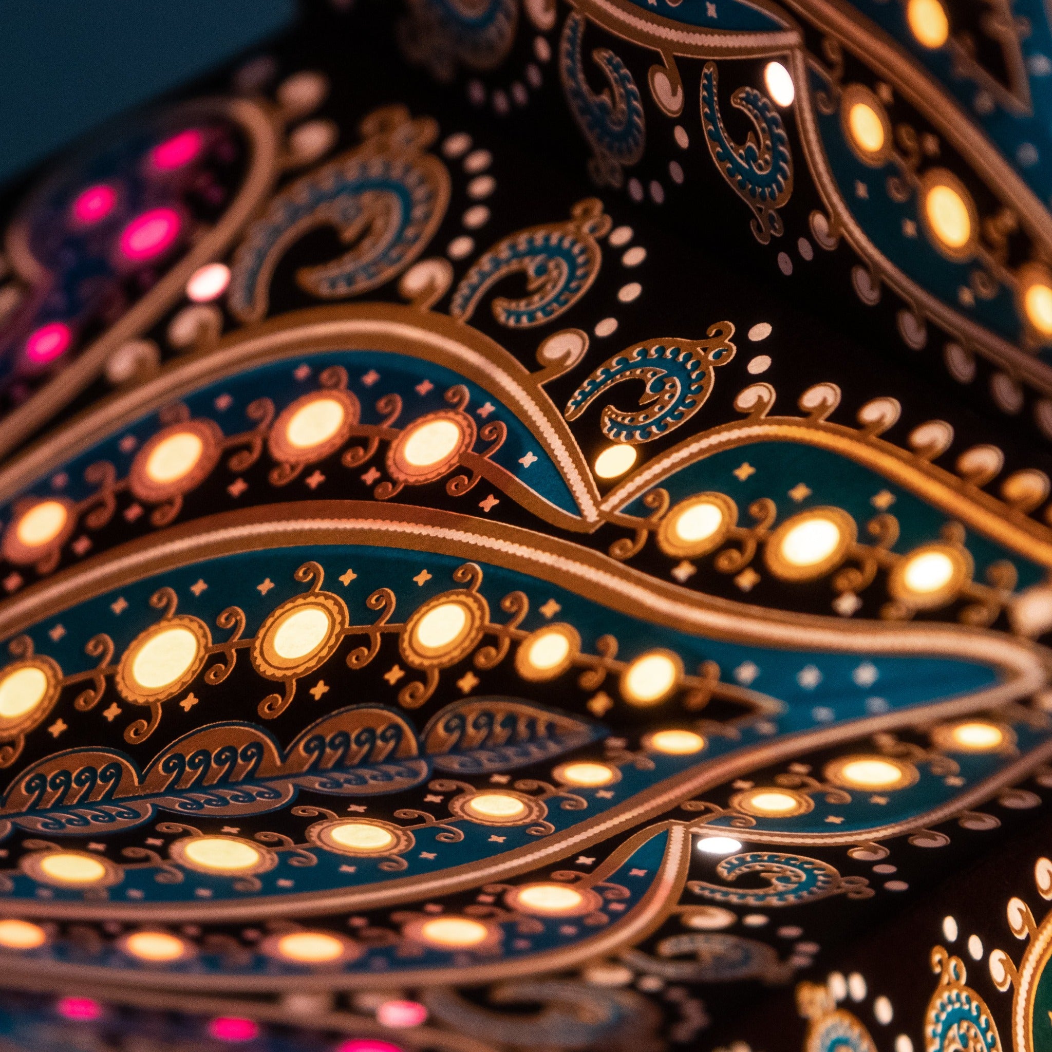 black patterned star lantern with warm glow