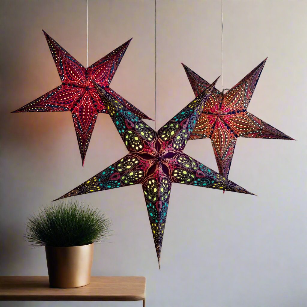 illuminated 3 multi coloured stars (pinks/purples)