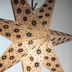 close up of white paper star lantern