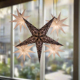 4 white stars and 1 large black/white star illuminated