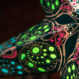 close up of teal and multi coloured tissue star lantern