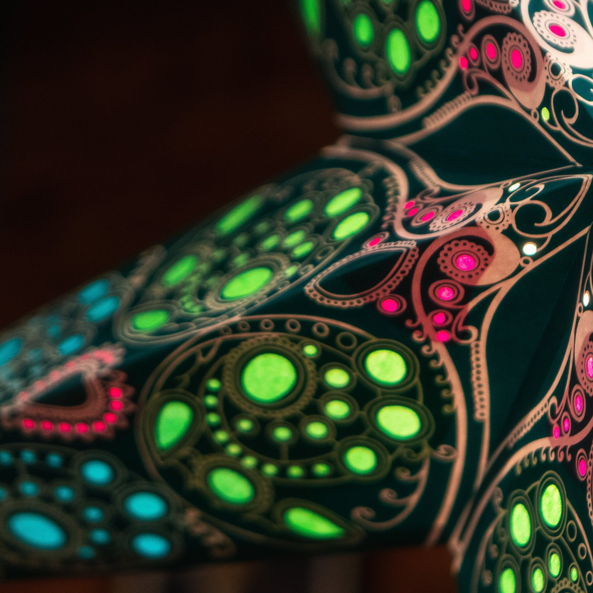 close up of teal and multi coloured tissue star lantern