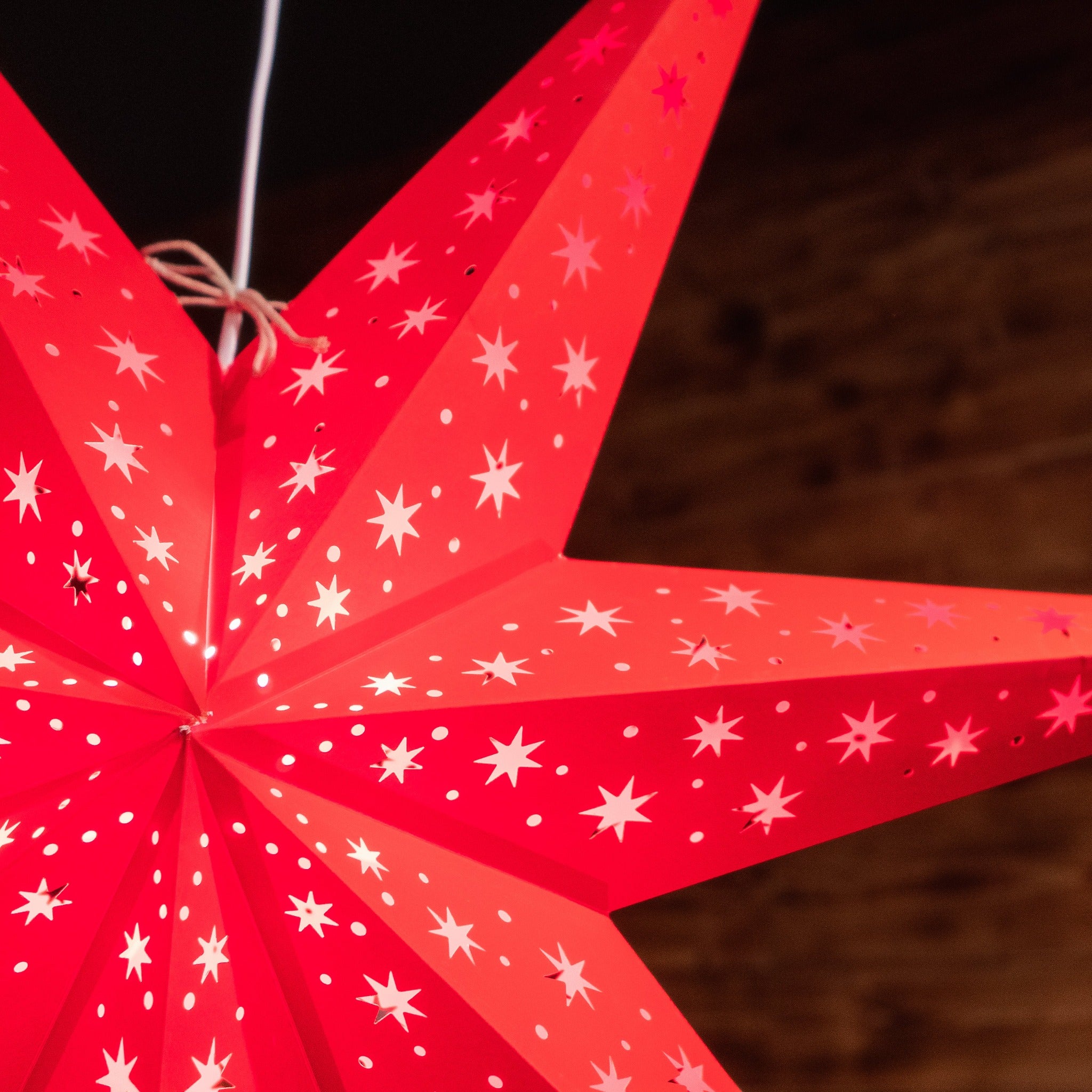 close up of red large star lantern