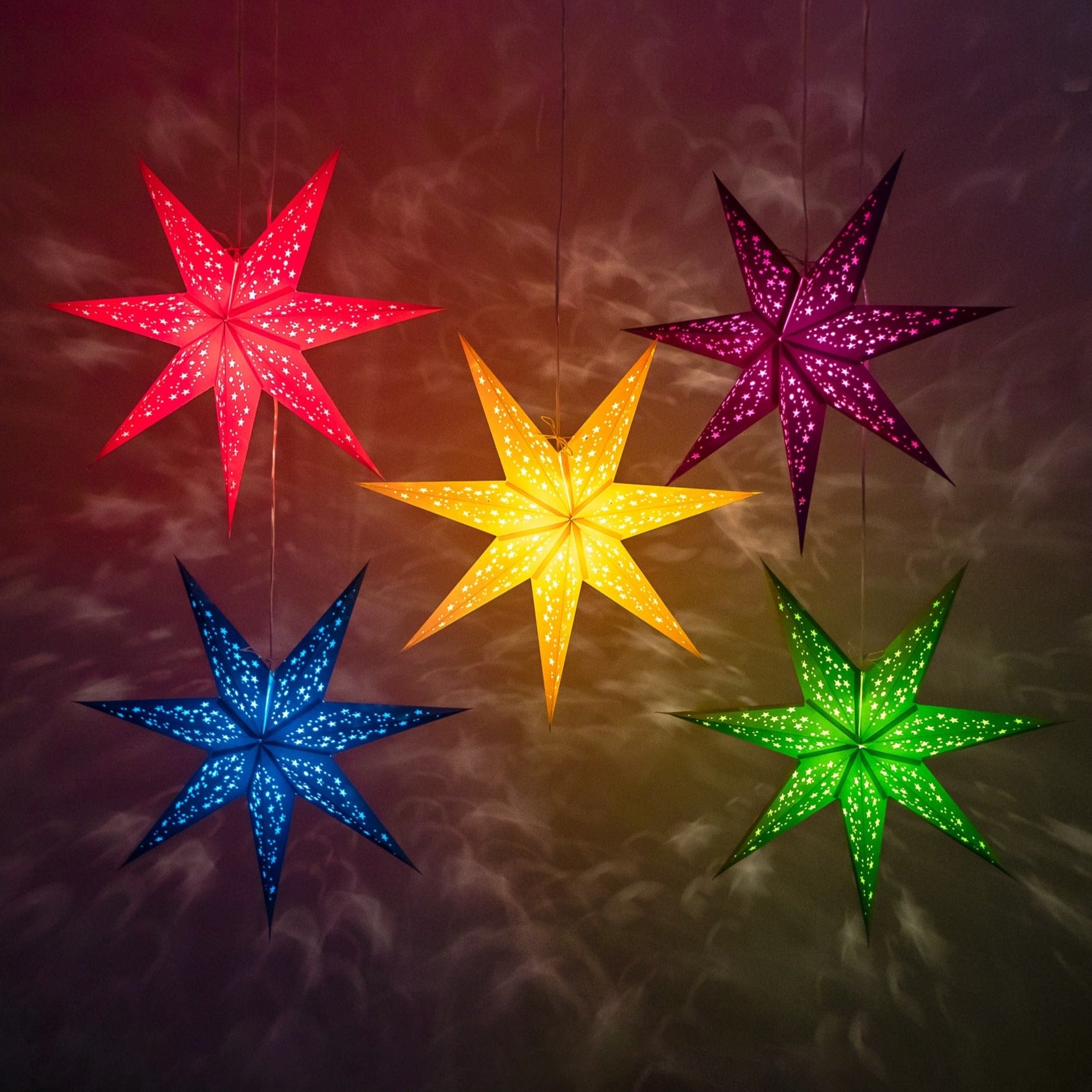 Decorative star lanterns crafted from coloured paper