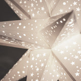 close up of white paper star lantern
