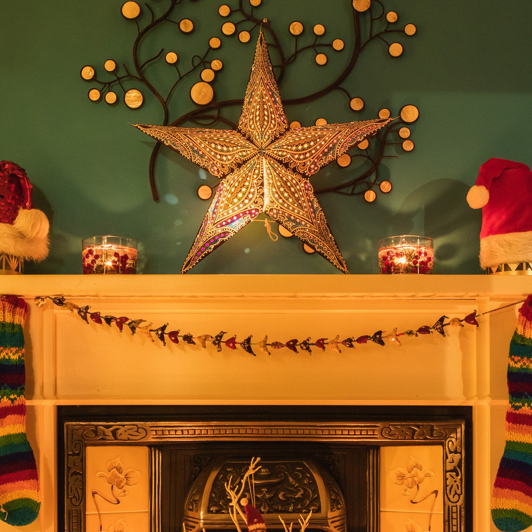 black patterned star lantern with warm glow