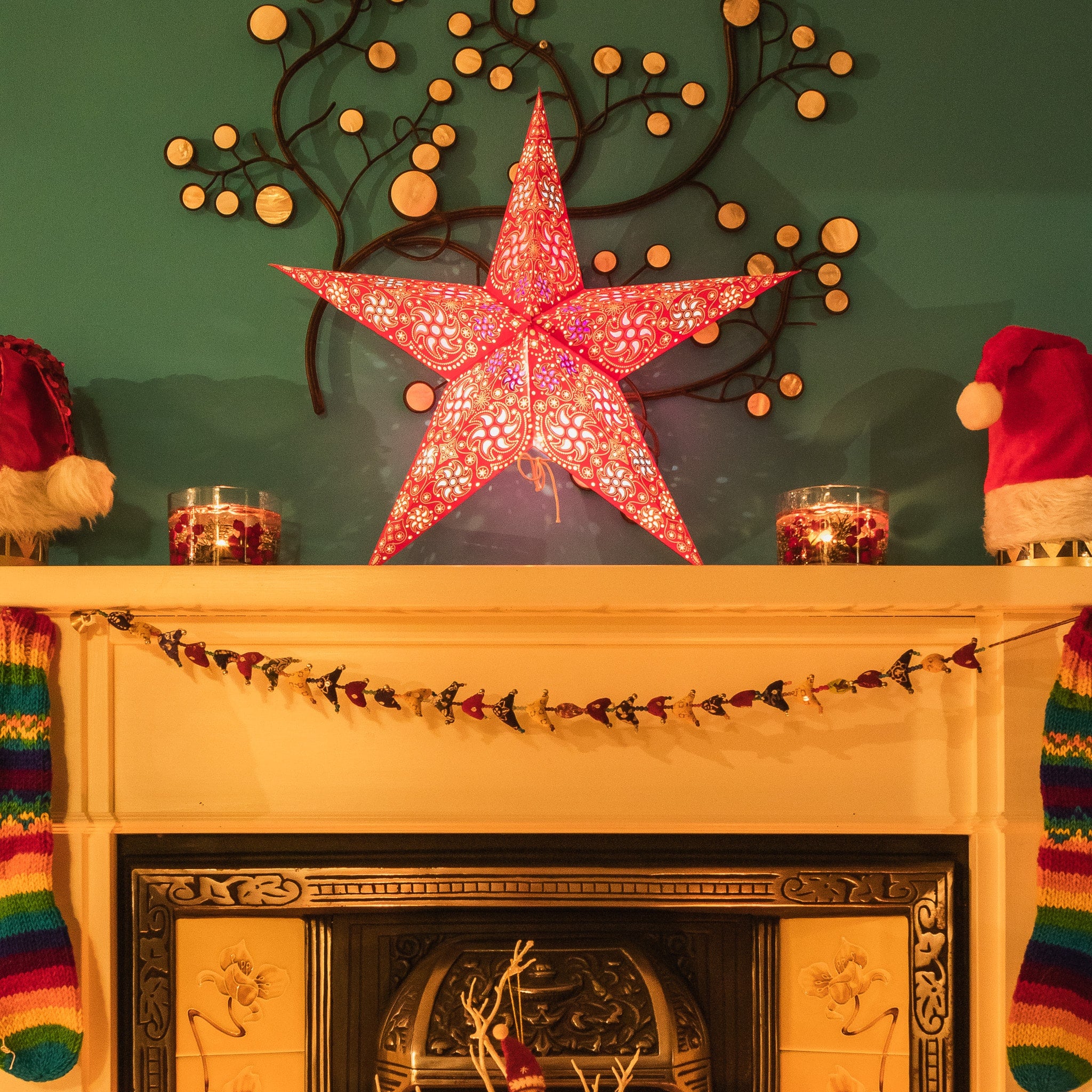 red firework patterned star lantern illuminated