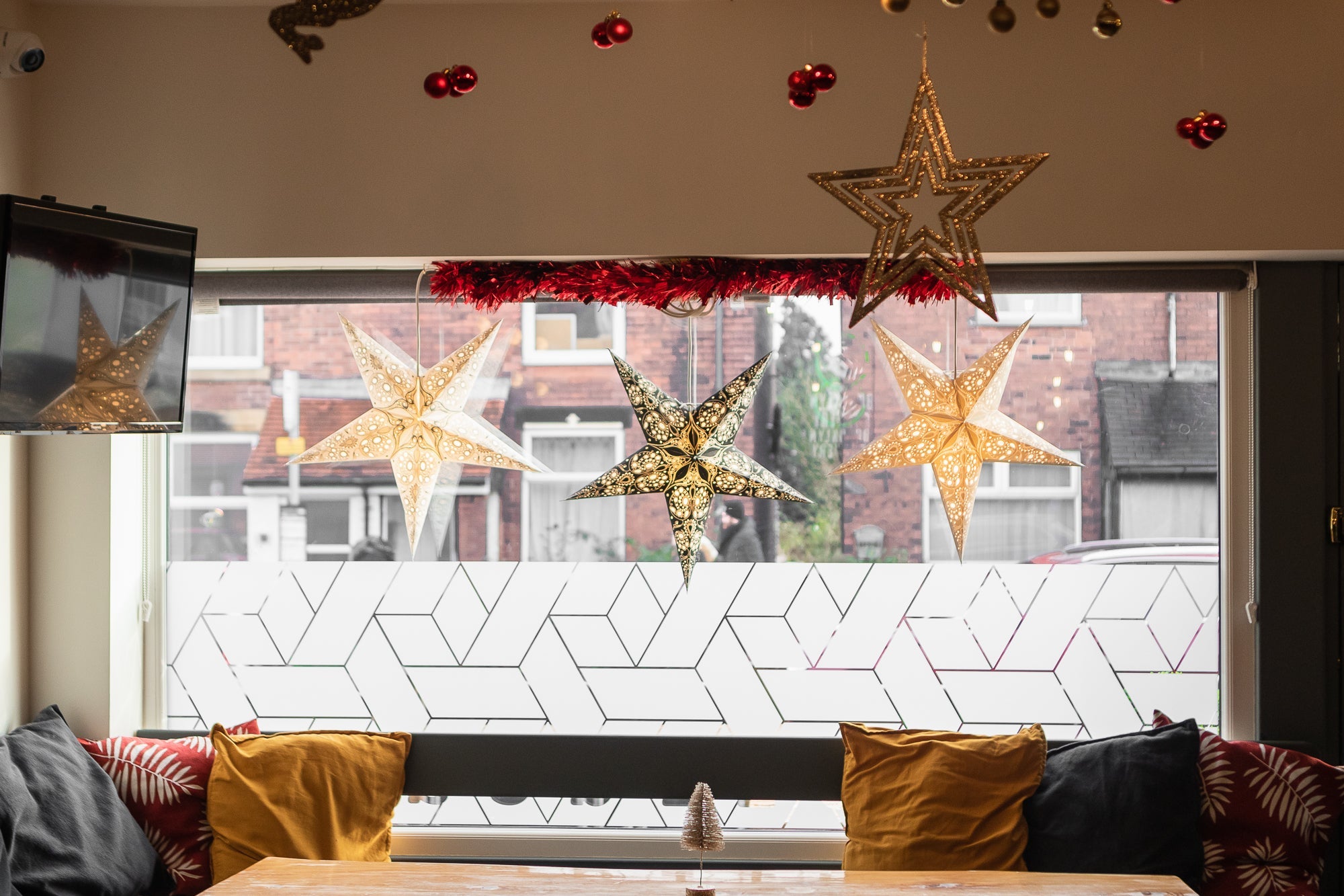 Illuminated Paper Starlights window display