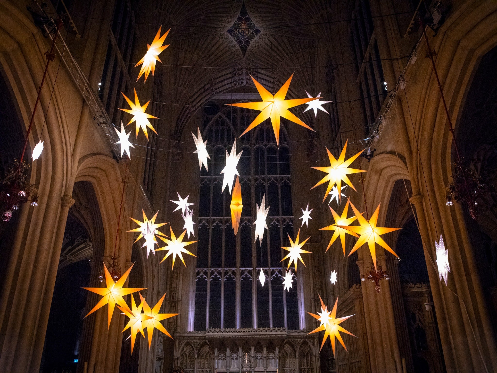 Light of Stars illuminated paper star installation inside Bath Abbey