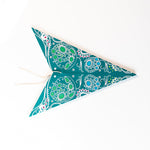 folded aquamarine paper star lantern