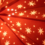 close up of large red star lantern