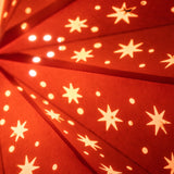 close up of red paper star