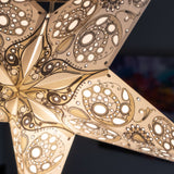 close up of white/ivory patterned star lantern