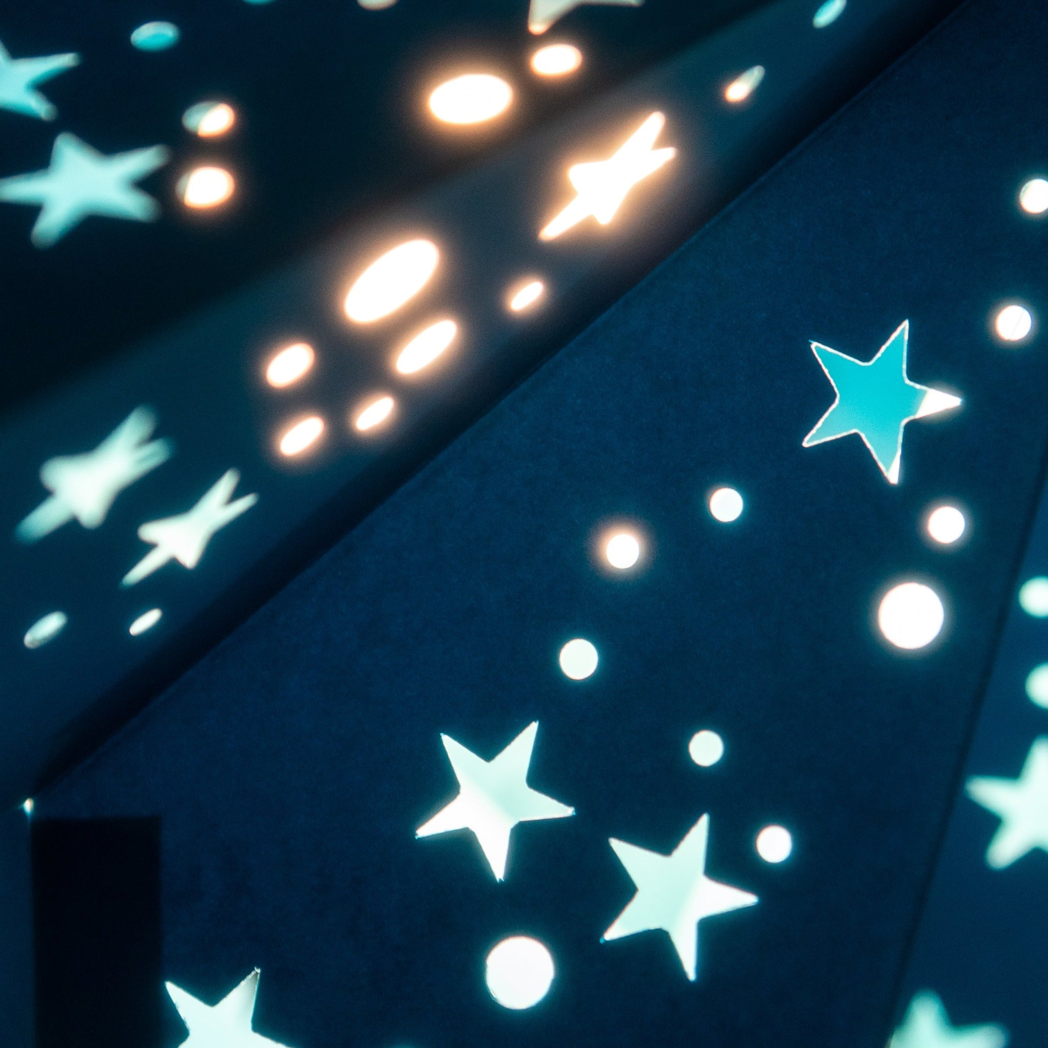 close up of blue paper star lantern