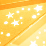 close up of yellow star lantern