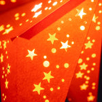 close up of orange star lantern
