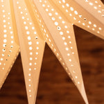 close up of points of paper star