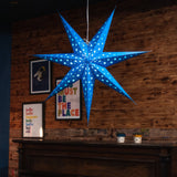 blue paper star lantern illuminated