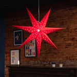 red paper star lantern illuminated - large Christmas star decoration