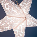geometric white star with tissue