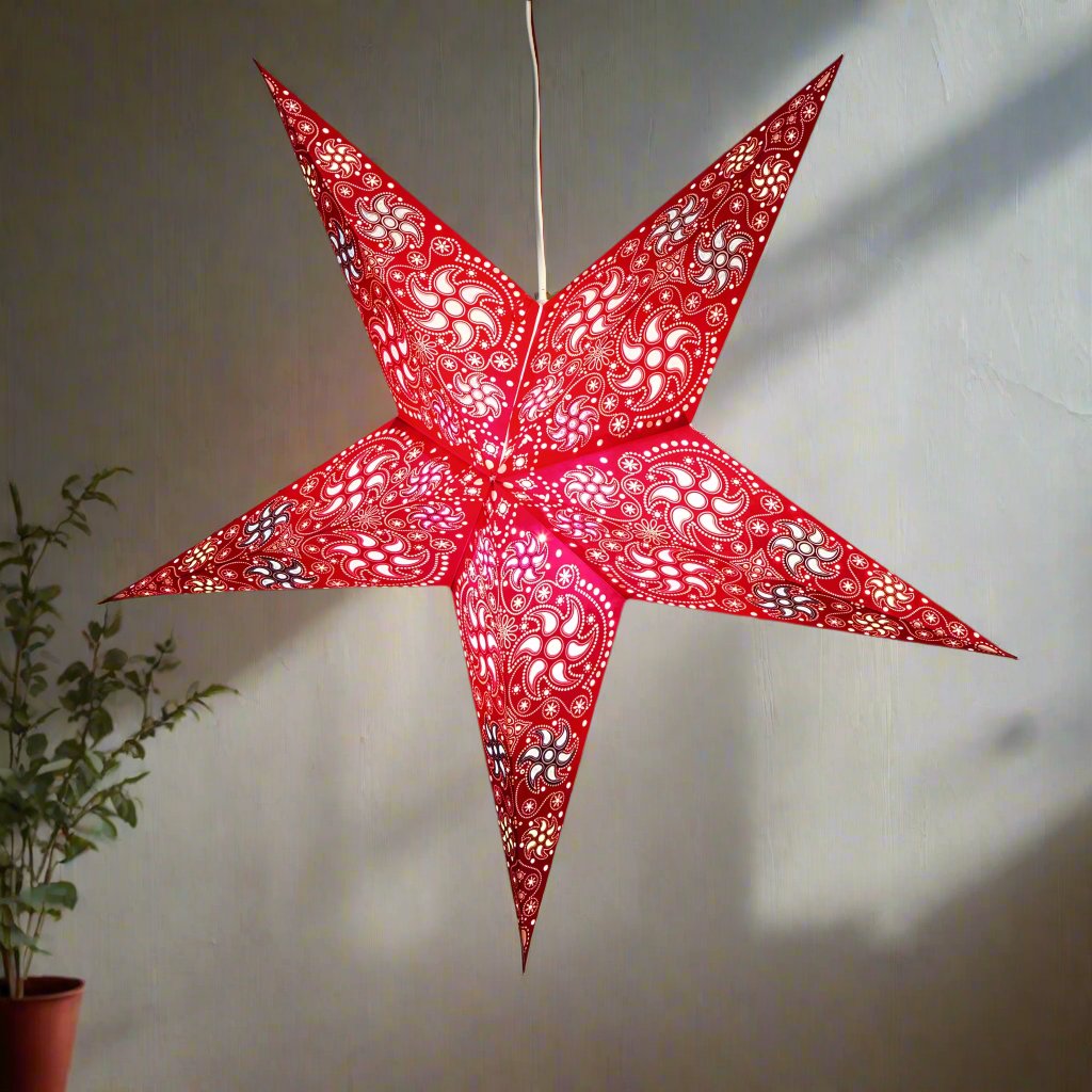 red firework patterned star lantern illuminated 