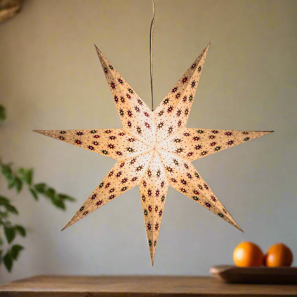 white and multi tissue star lantern illuminated