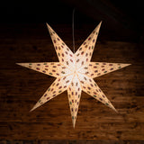 white and multi tissue star lantern illuminated